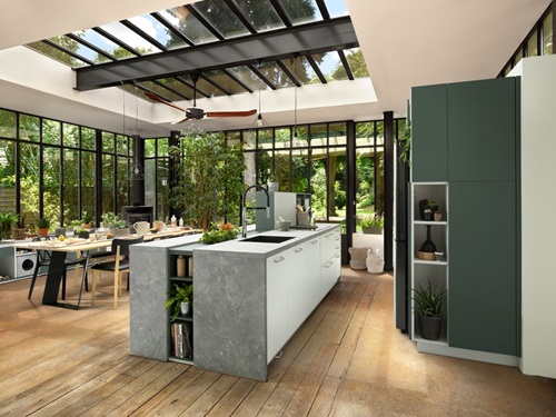 Kitchen with glass panelling opening onto garden