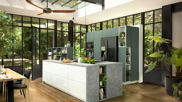 Kitchen with glass panels and concrete worktops
