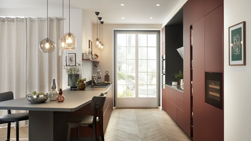 Black and red kitchen with peninsula