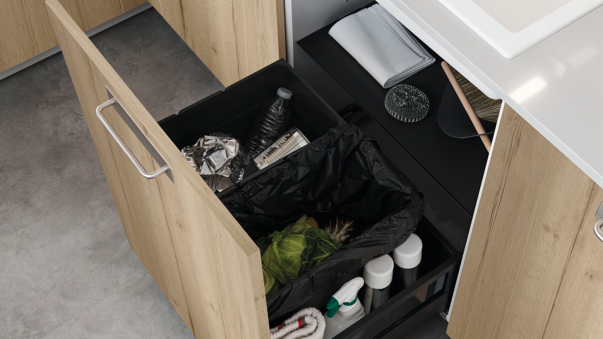 Mueble bajo el fregadero con bandejas de almacenamiento y separación de residuos integradas.