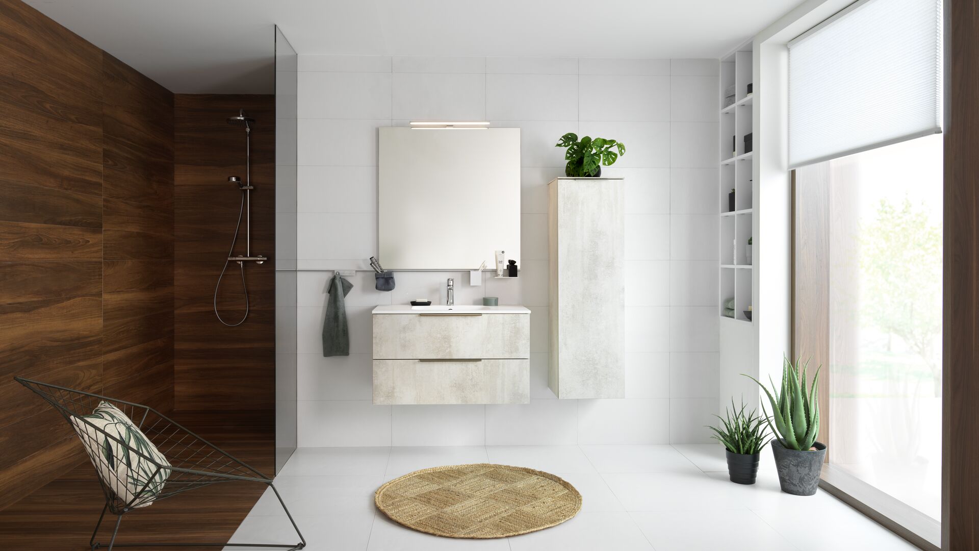 Compact bathroom with waxed concrete effect and suspended furniture