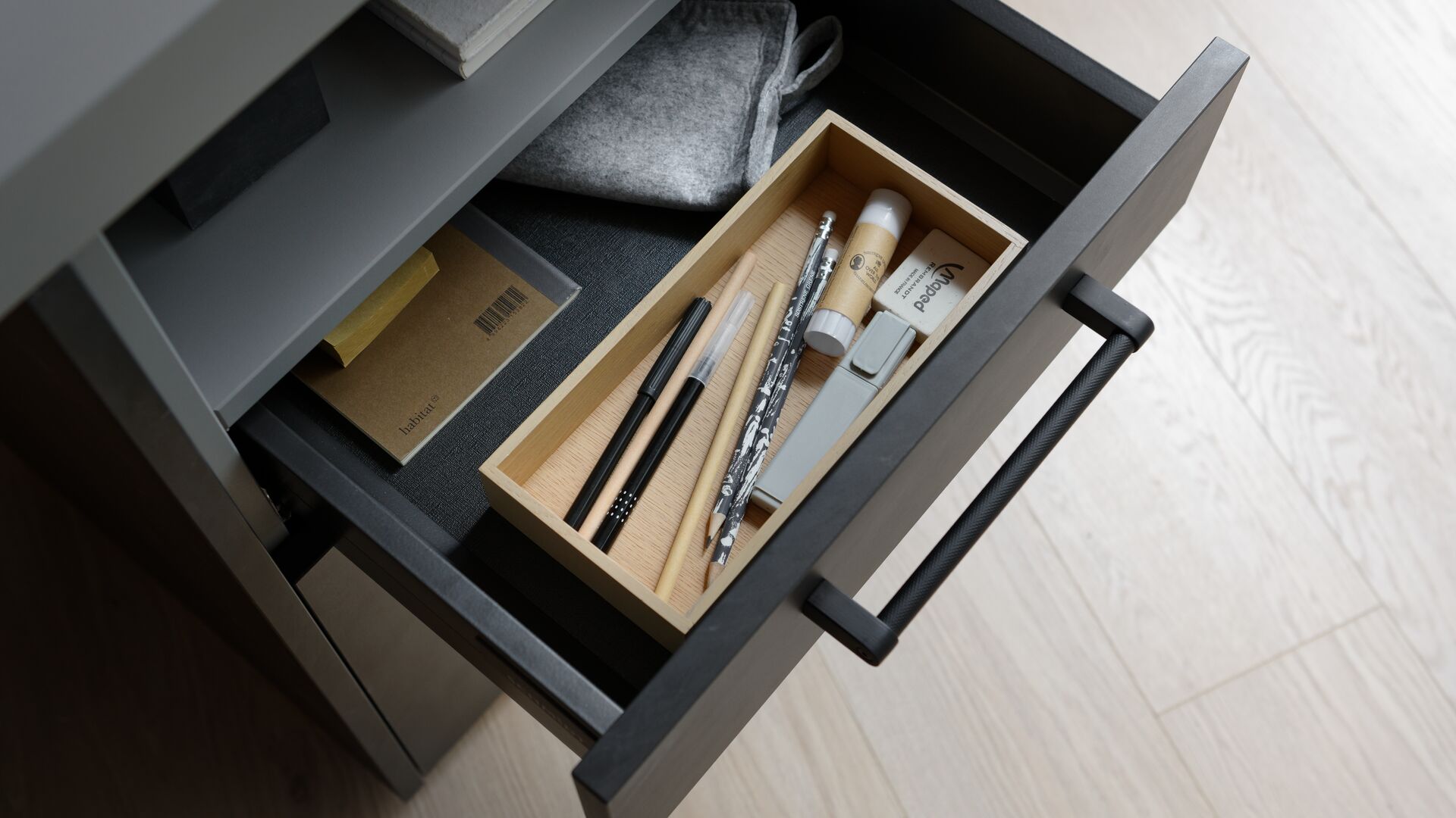 Desk drawer with longitude storage box and black handle